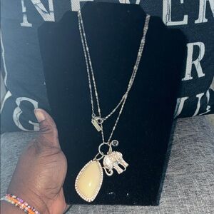 INC Gold and Silver Elephant Pendant Necklace long necklace wrapped to show de